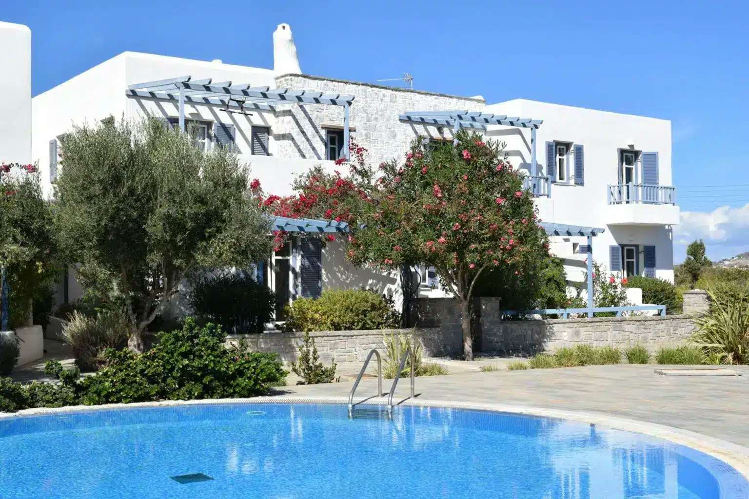 https://immigrantinvest.com/wp-content/uploads/2020/06/paros-gardens-biock-of-flats.-min-scaled-e1596290618585.jpg.webp