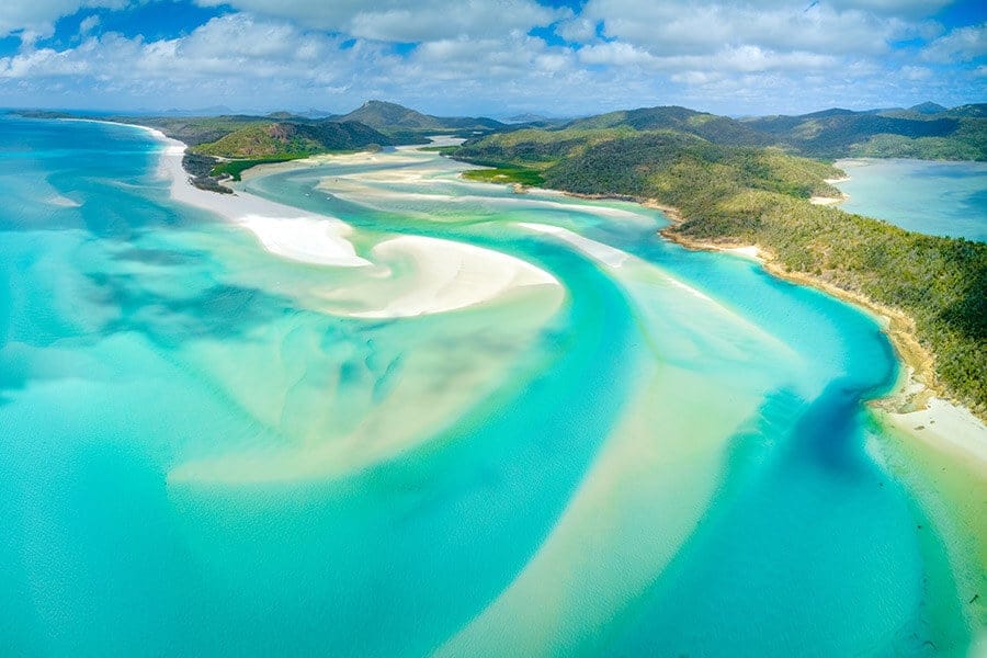 Australia residency by investment: Whitsunday Islands between Queensland and the Great Barrier Reef