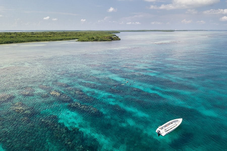 Caribbean citizenship by investment in real estate investment. The Belize Barrier Reef